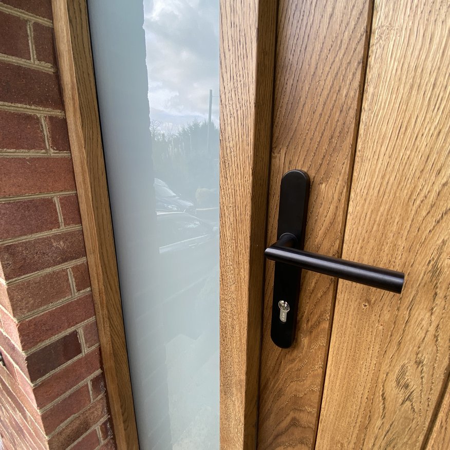 Bespoke European Oak door with satin glass black osmo